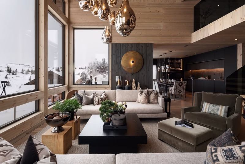 Elegant Scandinavian-style living room with large windows and wooden details.