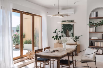 A spacious Scandinavian-style living room with a view of the garden.